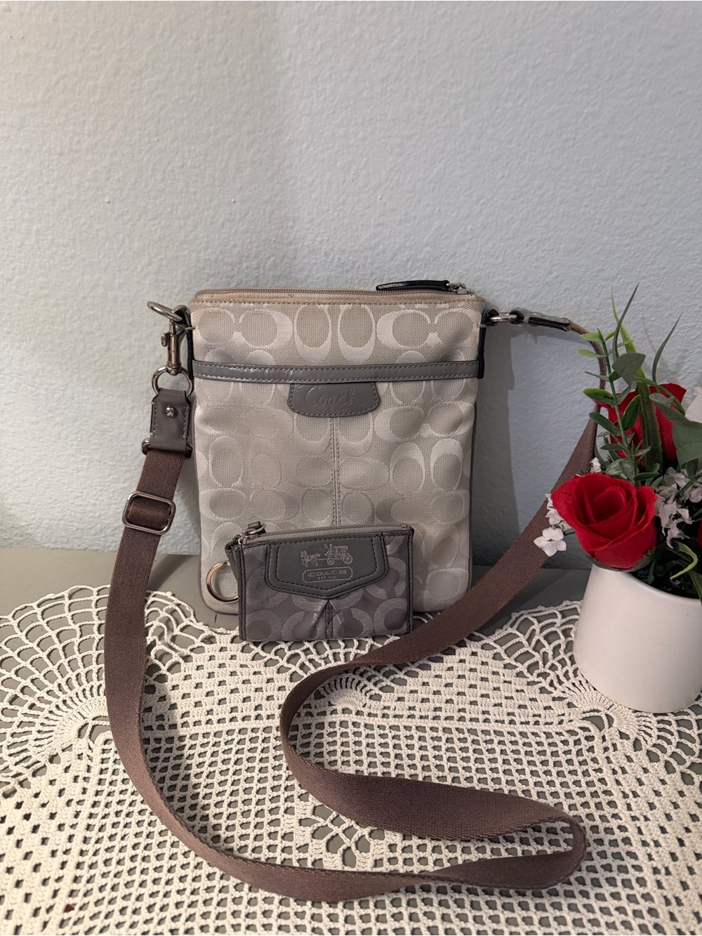 Coach mini  Taupe Signature Crossbody  with Brown Strap with small wristlet .